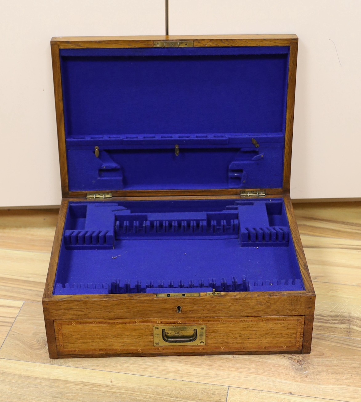 An inlaid oak canteen case, without contents, 48cm